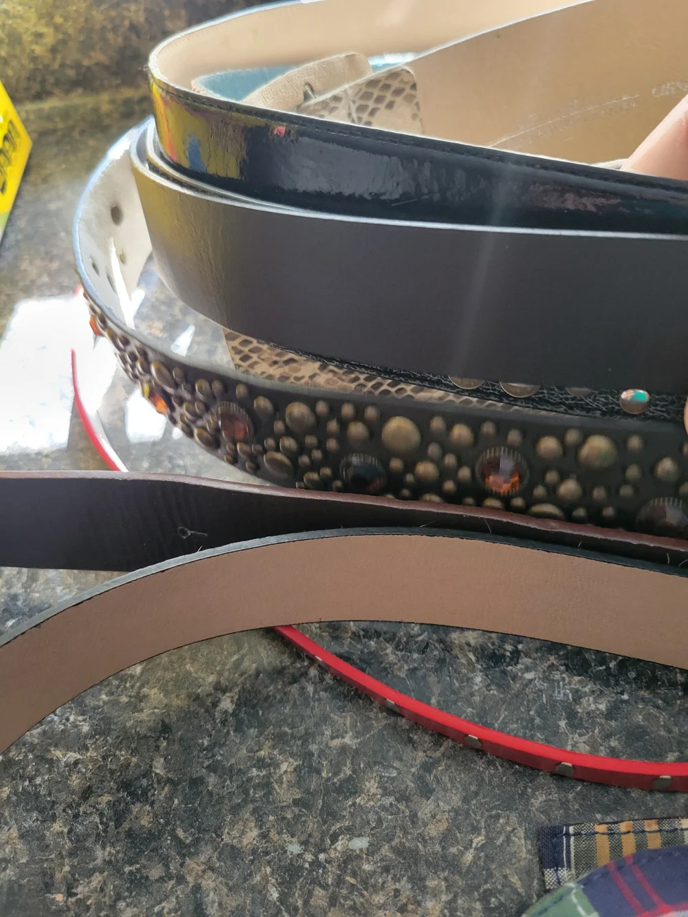 Lot of 18 belts from various brands with Pink, Black, Brown and prints